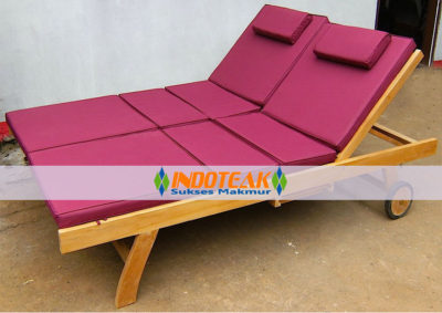 Teak double sun lounger with red cushions for outdoor garden furniture